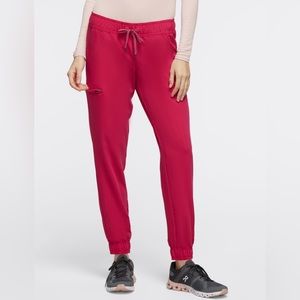 LIMITED EDITION electric magenta Jaanuu women’s 5-pocket skinny scrub joggers